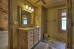 Reel Creek Lodge - Private Bathroom w/ Large Walk-In Stone Shower 
